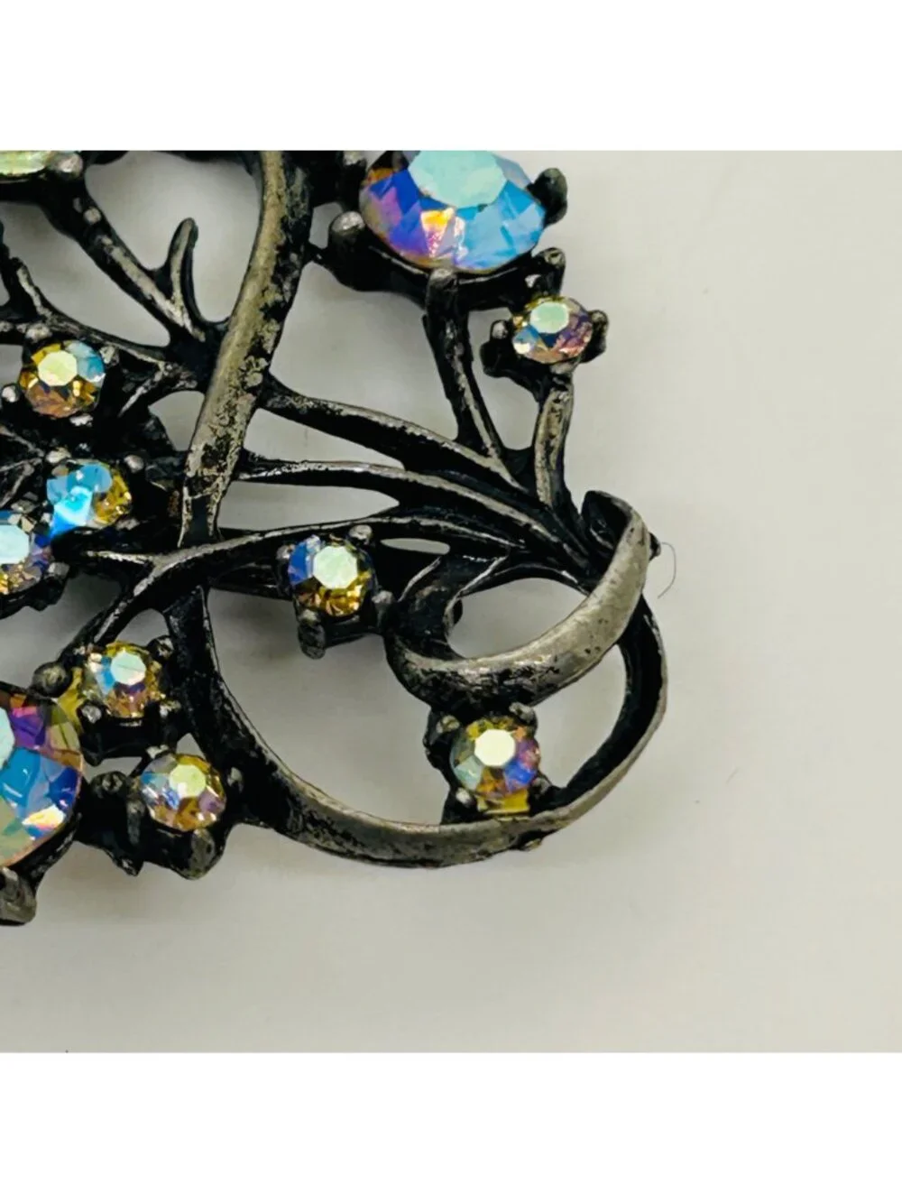 Vintage Aurora Borealis Rhinestone Brooch Peacock Colored Pin Gunmetal